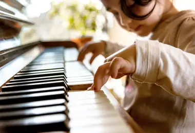 Child playing piano