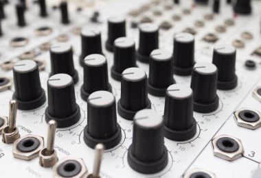 Knobs on analog synthesizer